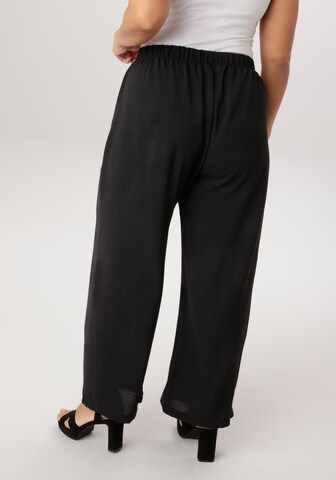 Aniston Wide leg Pants in Black