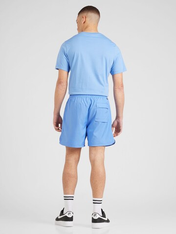 Nike Sportswear Normalny krój Spodnie 'Essentials' w kolorze niebieski