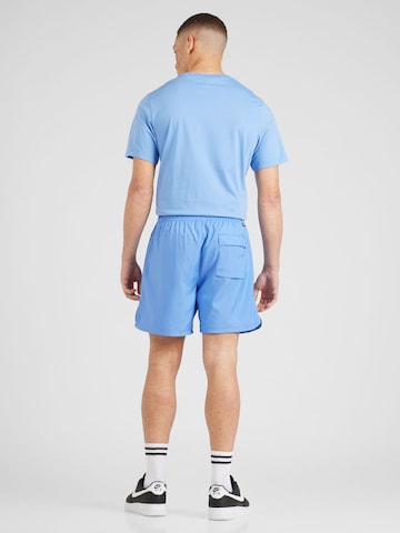 Regular Pantaloni 'Essentials' de la Nike Sportswear pe albastru