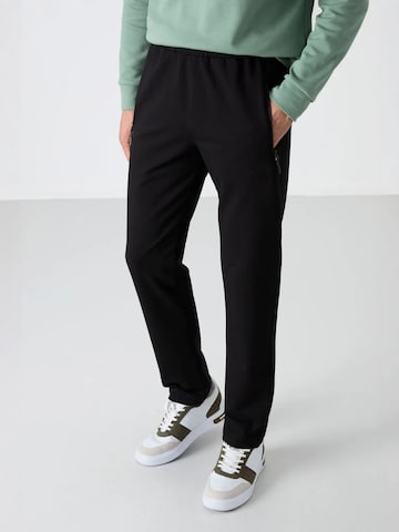 Tommy Life Normální Sportovní kalhoty 'Jogginghose' – černá: přední strana