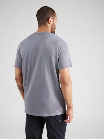 UNDER ARMOUR Funkcionalna majica | siva barva