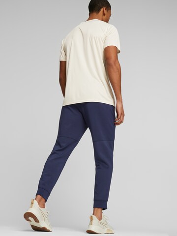 PUMA Tapered Sportbroek in Blauw