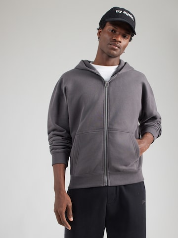 Veste de survêtement HOLLISTER en gris : devant