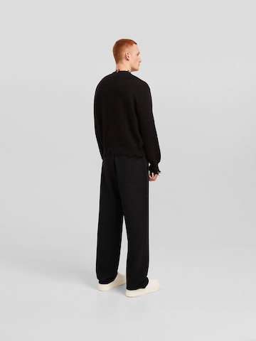 Bershka Loose fit Pleat-front trousers in Black