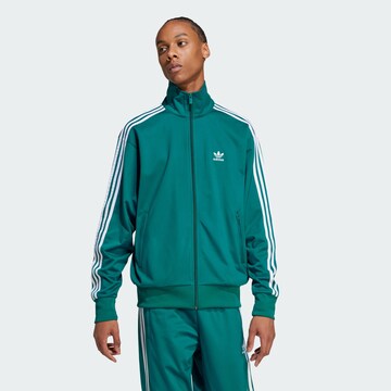 Veste de survêtement ADIDAS ORIGINALS en bleu : devant