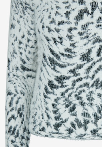 swirly Pullover in Weiß