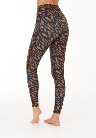 Skinny Pantalon de sport 'Windia' Athlecia en marron