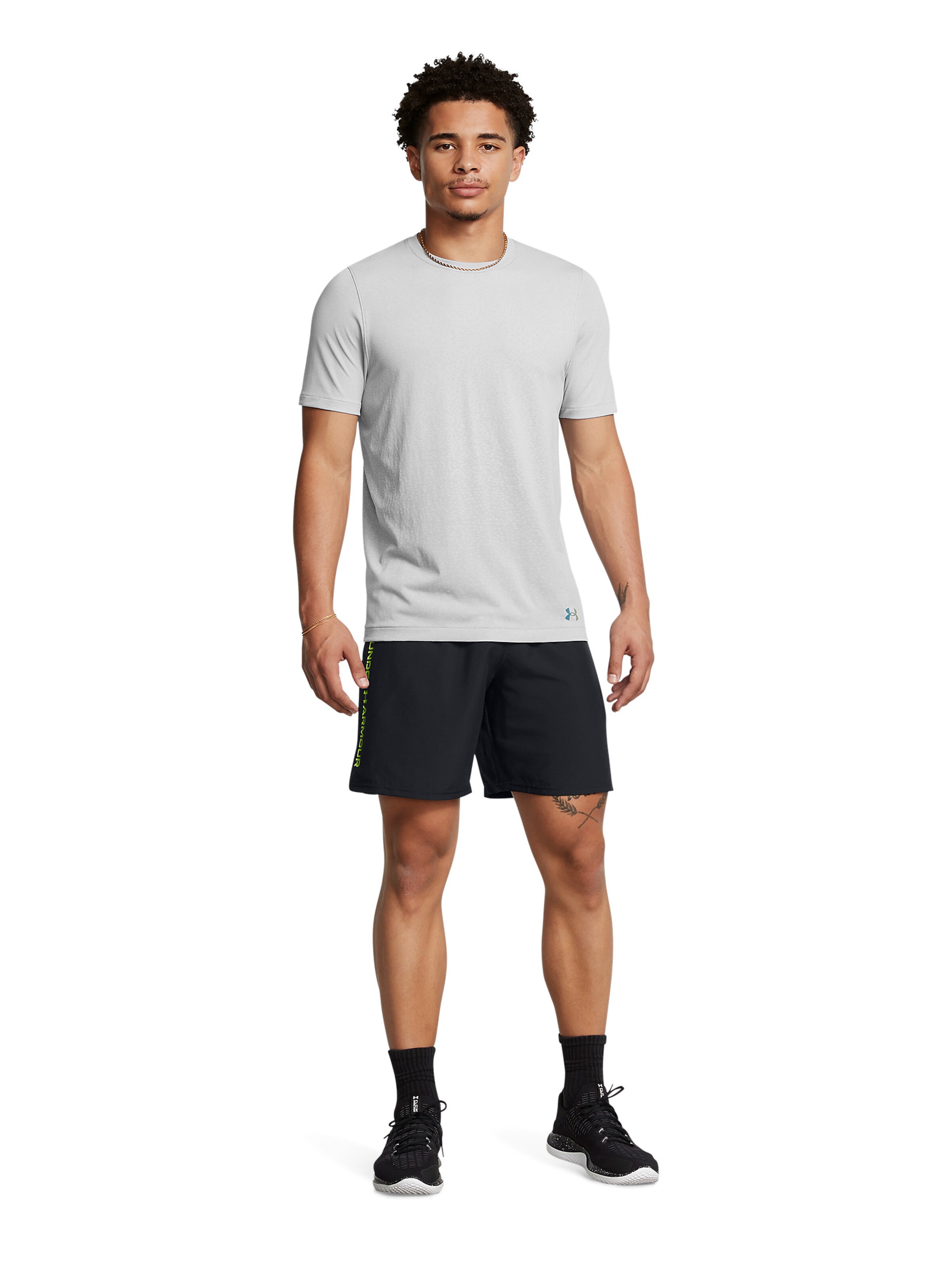 Regular Pantalon de sport 'Wordmark' UNDER ARMOUR en noir