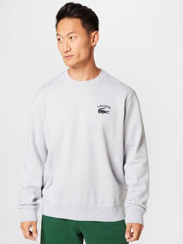 Sweat-shirt LACOSTE en gris : devant