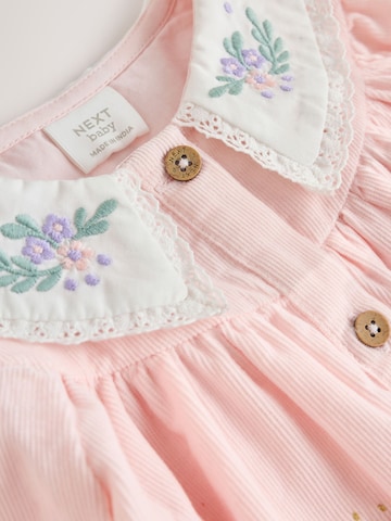Set Next en rose