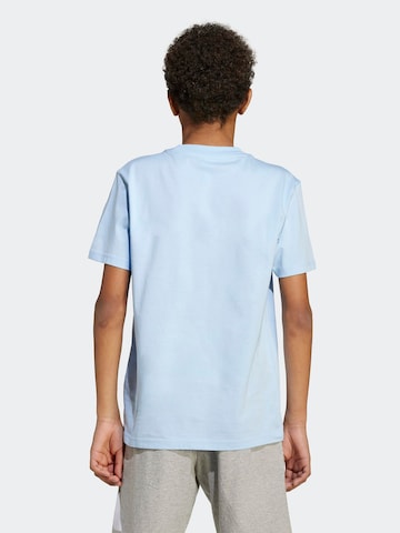ADIDAS SPORTSWEAR - Camiseta funcional en azul
