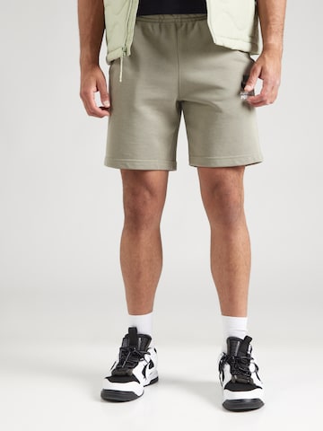 Nike Sportswear Szabványos Nadrág - zöld: elől