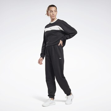 Reebok Trainingspak in Zwart: voorkant