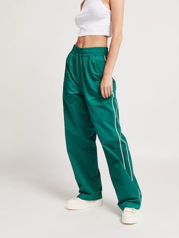 UNFOLLOWED x ABOUT YOU Regular Pants 'ESCAPE PANTS' in Green: front