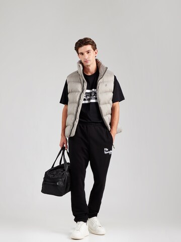 Tapered Pantaloni sport 'LESGES' de la FILA pe negru