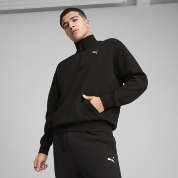 PUMA Sweatshirt 'Wardrobe Ess' in Zwart