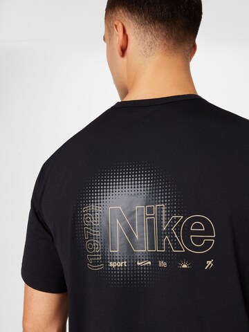 NIKE - Camiseta funcional 'HYVERSE' en negro