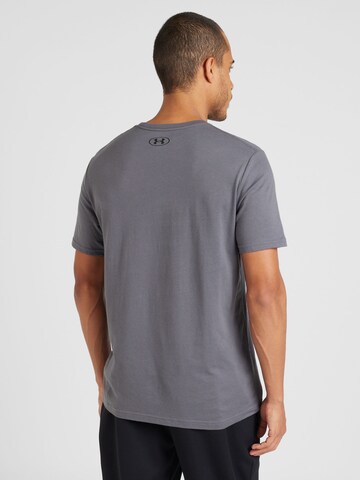 Maglia funzionale di UNDER ARMOUR in grigio