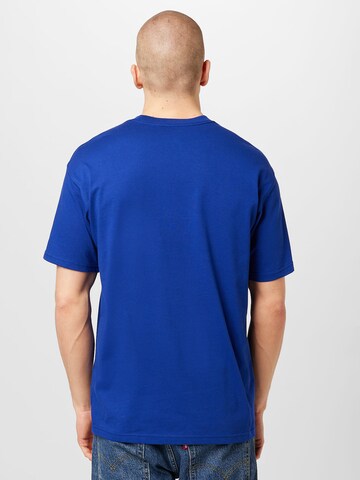 Nike Sportswear T-shirt 'FUTURA' i blå