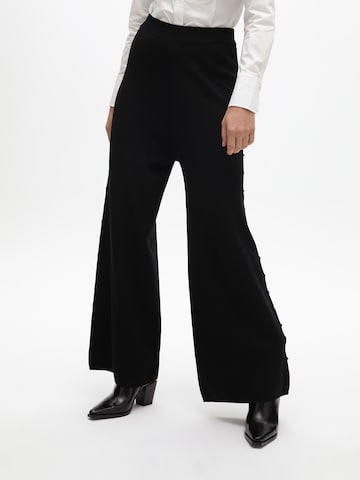Wide leg Pantaloni di Lola Casademunt in nero
