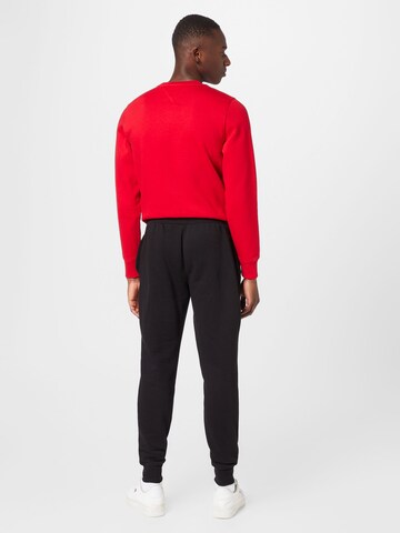 TOMMY HILFIGER Tapered Trousers in Black