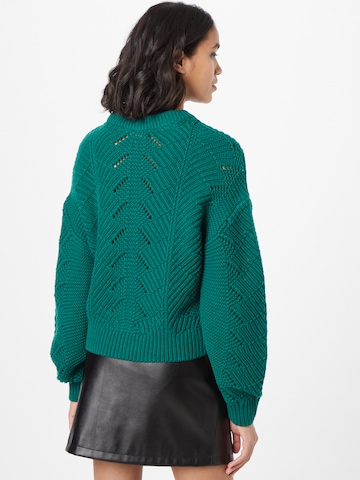 Noisy may Sweater in Green