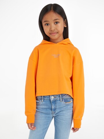 Bluză de molton de la Calvin Klein Jeans pe portocaliu: față