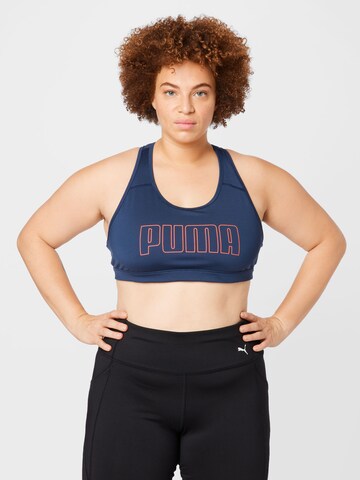 PUMA Medium Support Sports Bra in Blue: front