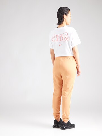 Nike Sportswear Tapered Nadrág 'Chill' - sárga