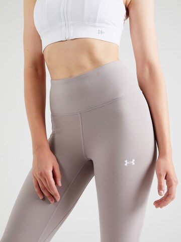 Skinny Pantalon de sport 'Motion' UNDER ARMOUR en violet