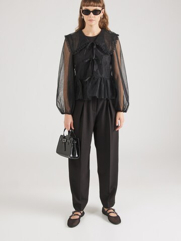 Monki - Blusa en negro