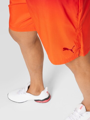 PUMA Regular Workout Pants in Orange