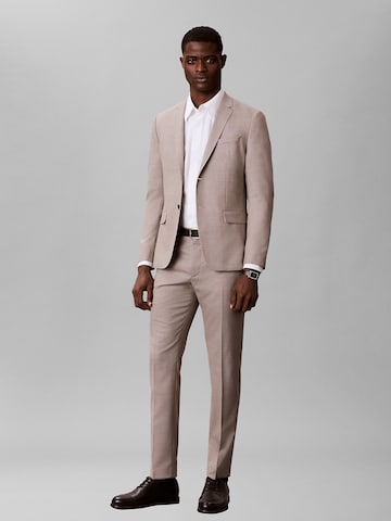 Coupe slim Pantalon à plis Calvin Klein en beige