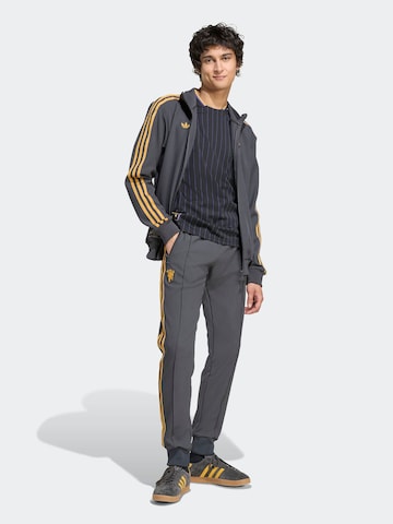 ADIDAS ORIGINALS - Sudadera con cremallera deportiva 'Manchester United Terrace Icons' en negro