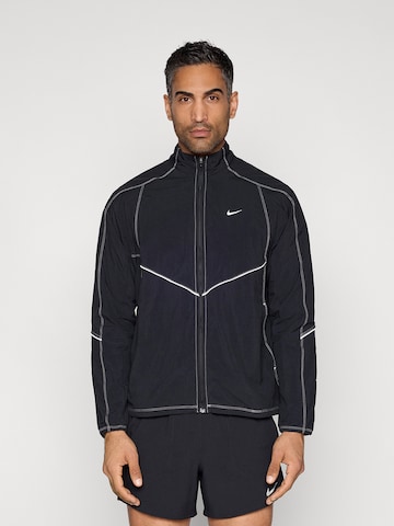 NIKE Athletic Jacket in Black: front