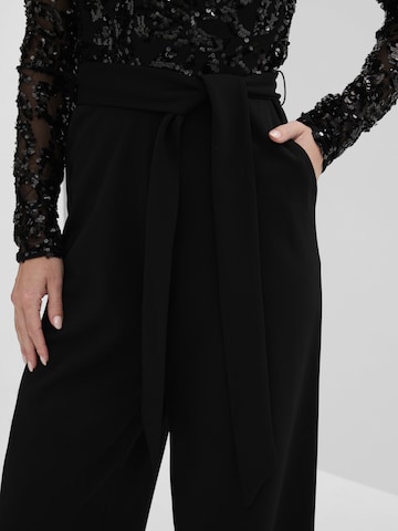 Tuta jumpsuit di bonprix in nero