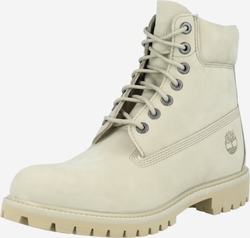 TIMBERLAND Boots med snörning i brun: framsida