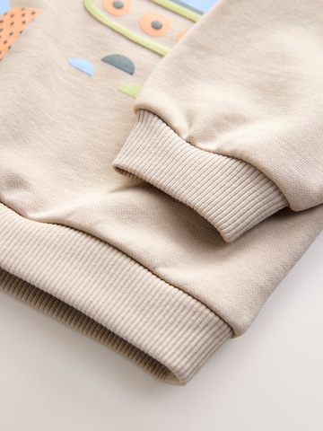 Sweat Next en gris
