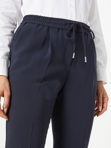 BOSS Regular Trousers with creases 'Tariyana' in Blue