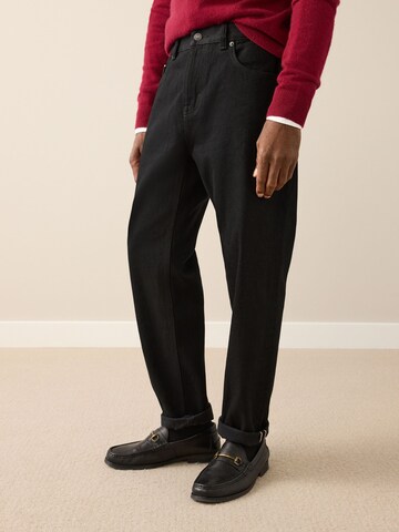 Next Tapered Jeans in Black: front