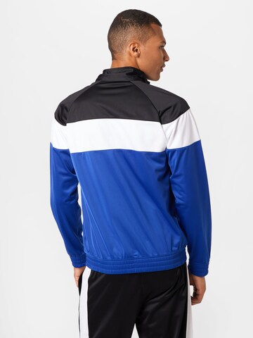 Champion Authentic Athletic Apparel Tracksuit in Blue