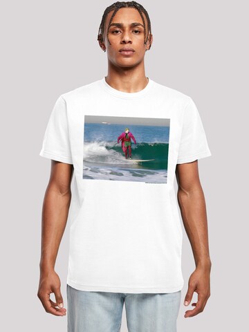 T-Shirt 'Batman TV Series Joker Surfing' F4NT4STIC en blanc : devant