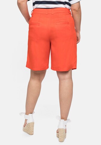 Loosefit Pantalon à pince SHEEGO en orange