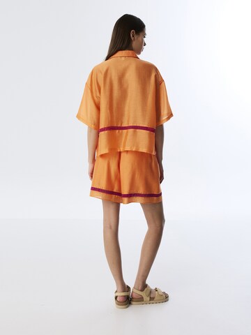 Twist Blouse in Oranje