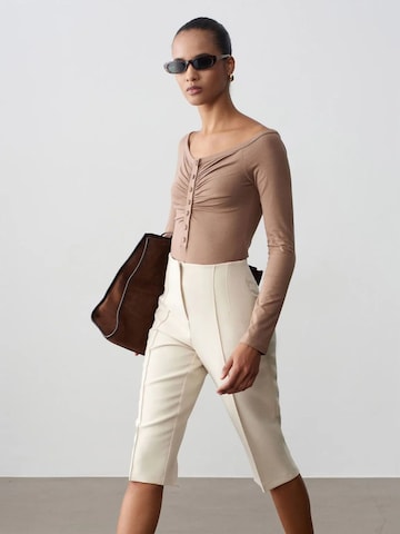 Slimfit Pantaloni con piega frontale di Dilvin in beige