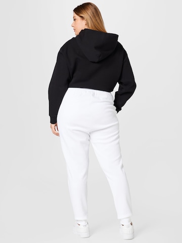 Calvin Klein Curve Zwężany krój Spodnie w kolorze biały