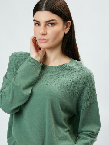 Influencer Neulepaita värissä vihreä