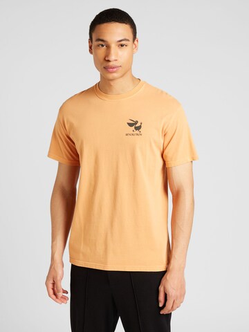 Revolution T-shirt i orange