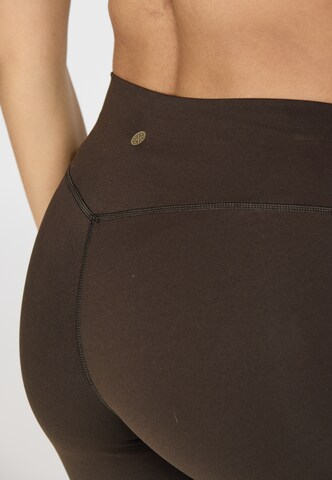 Athlecia Skinny Tights 'Luxe' in Braun