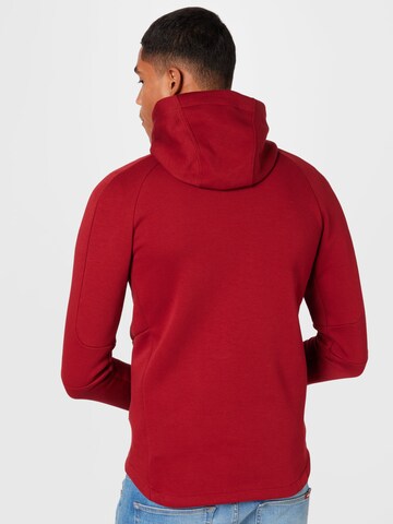 Veste de survêtement PUMA en rouge